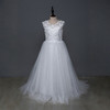 White sleeveless satin flower girl dress with princess-inspired styling