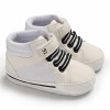 Generic White Shoe Baby Boy White, baby boy white sneakers with black and white laces and velcro strap.