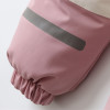 Minnie Me Waterproof Jumpsuit Kids Ski Suit, close-up view of the pink waterproof jumpsuit with reflective stripe and elasticized bottom hem for kids' winter snow activities.