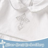 Minnie Me Yeshua Cross Embroidery Romper, close-up of the white romper featuring intricate silver cross embroidery on the front and delicate silver trim details.