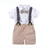 OONA Short-Sleeve Romper Short Suit with Hat, white shirt with small printed patterns, beige shorts with suspenders and a bow tie