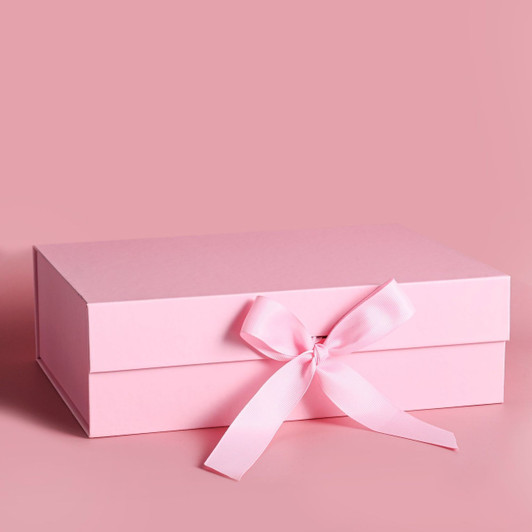 OONA Folding Pink Gift Box with Satin Ribbon, pink paper gift box with a satin ribbon tied in a bow, suitable for presenting gifts in a stylish way.