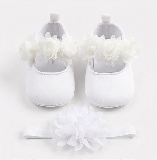 Generic White Floral Mary Jane Shoes With Headband, white baby shoes decorated with fabric flowers and rhinestones, accompanied by a matching headband with fabric flowers.