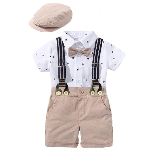 OONA Short-Sleeve Romper Short Suit with Hat, children's outfit featuring a white short-sleeve shirt with small black patterns, beige suspenders, matching beige shorts, and a beige hat.