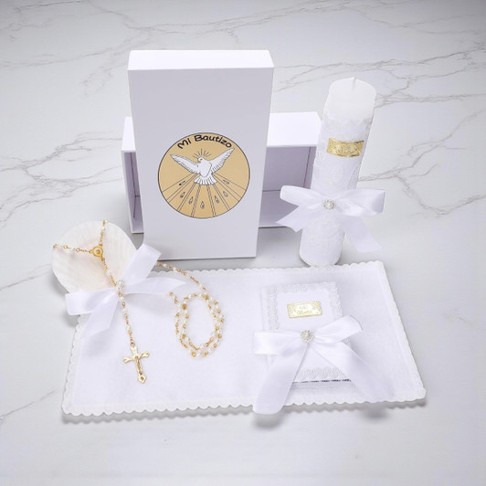 Minnie Me Elegant White Baptism set, including a decorative candle, rosary, and baptismal card with white bows and gold accents for a christening ceremony.