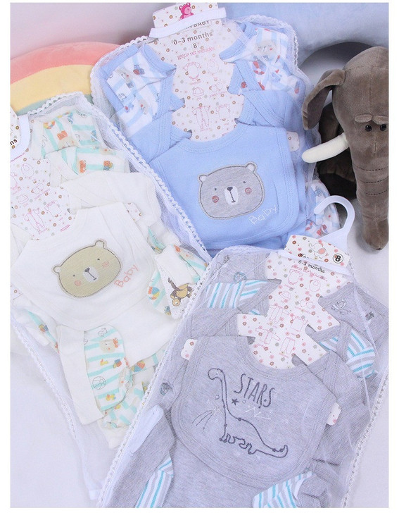 Generic White Sheep 8-Piece Layette Set, collection of baby clothes with bear and star embroidery, including a white, blue, and gray outfit, and a plush gray elephant toy.