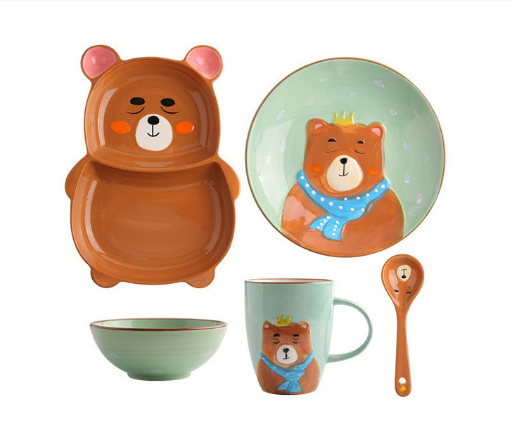 Generic Ceramic Bear Porcelain Tableware Set, featuring a bear-themed dinnerware with a bear-shaped plate, a bowl, a mug, a dessert spoon, and a round plate with bear illustrations and colorful accents.