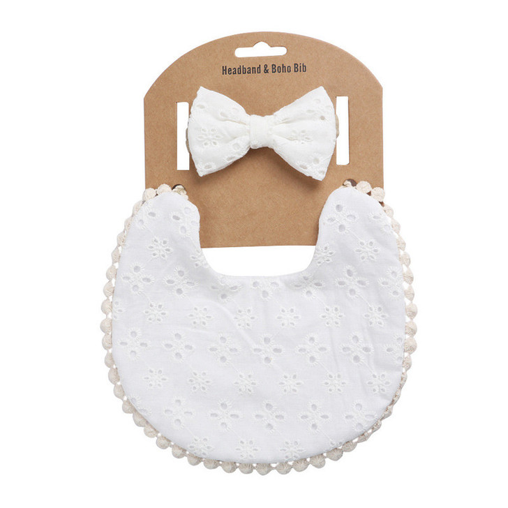 Generic Double-Sided Cotton Bib with Bow Headband Set, baby bib and matching bow headband on kraft paper packaging.