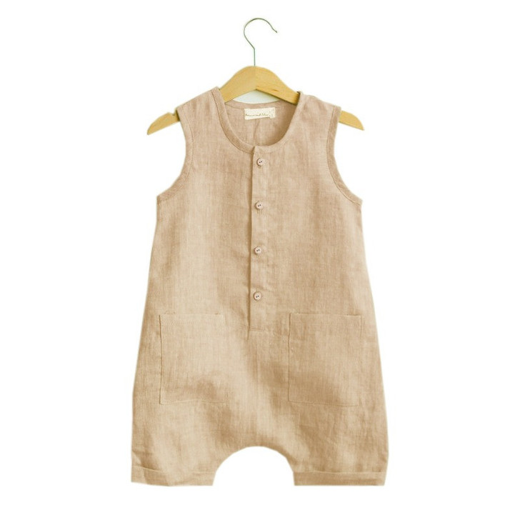 Generic Basic Linen Olive Green Beige Romper, beige linen sleeveless romper with front buttons and large front pockets hanging on a wooden hanger.
