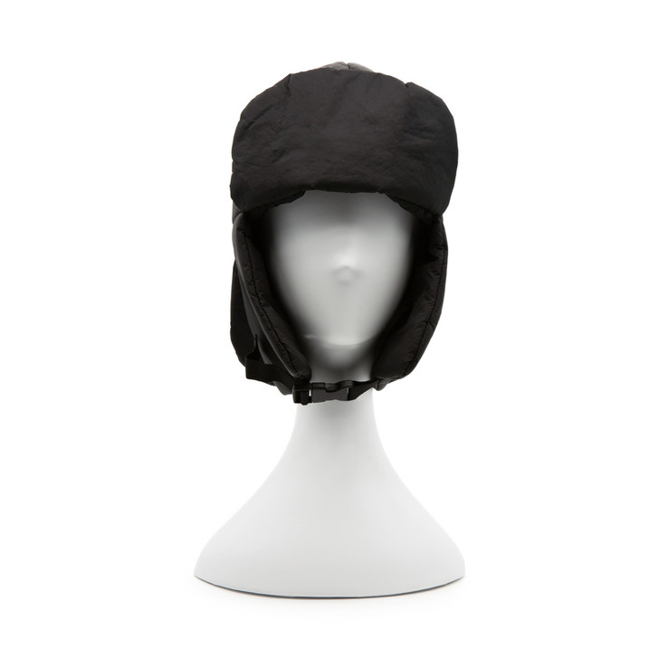 Generic Trapper Hat, black winter trapper hat with ear flaps and adjustable chin strap displayed on a white mannequin head.