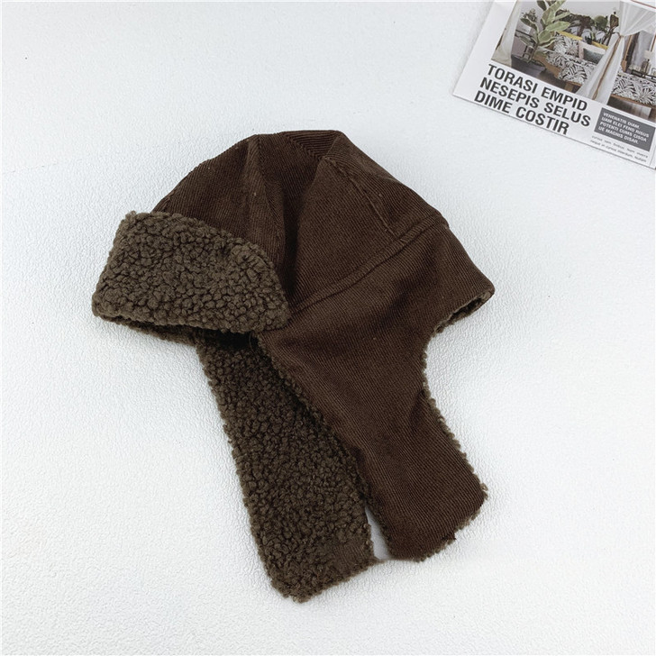 Generic Corduroy Hat With Earmuff, brown winter hat with plush earflaps and lining for warmth.