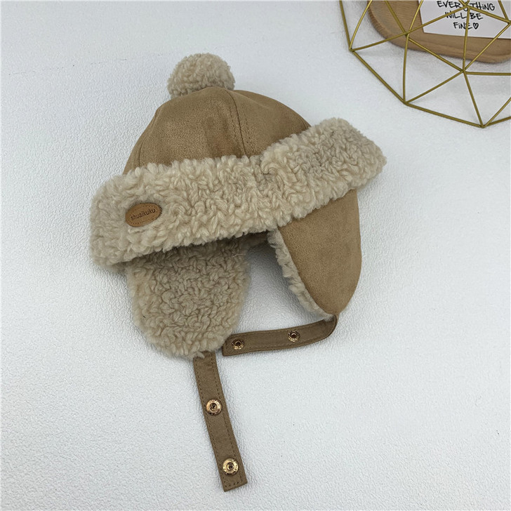 Generic Winter Hat With Brown Lamb Ear Flaps, beige hat with fluffy lamb ear flaps and pom-pom on top, soft and warm winter accessory for cold weather.