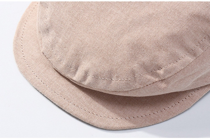 OONA Short-Sleeve Romper Short Suit with Hat, beige romper with a matching hat for young children.