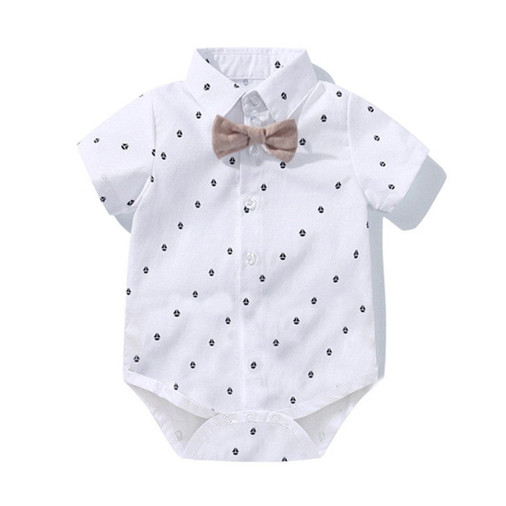 OONA Short-Sleeve Romper Short Suit with Hat, baby romper in white with small black print, includes a beige bow tie, perfect for summer or special occasions.