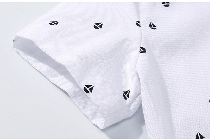 OONA Short-Sleeve Romper Short Suit with Hat, white romper with black sailboat print design.