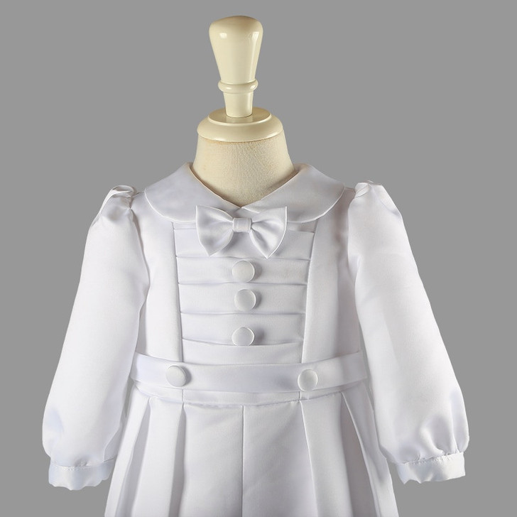 Generic White Baptism Outfits Full Sleeve Bow, a pristine white baptism dress for infants featuring long sleeves, decorative button detailing, and a matching bow at the collar.