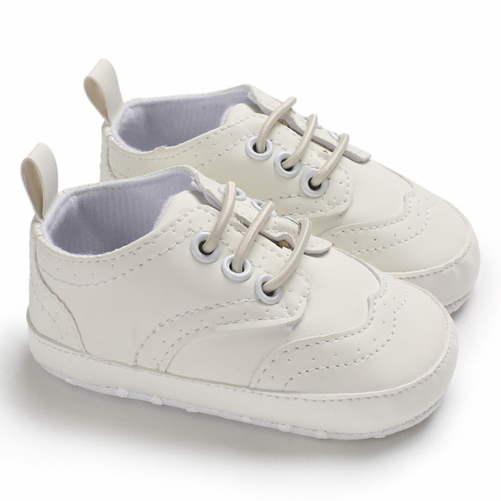 Generic White Shoe Baby Boy White, soft white baby shoes with laces and rear pull tab for toddlers and infants.