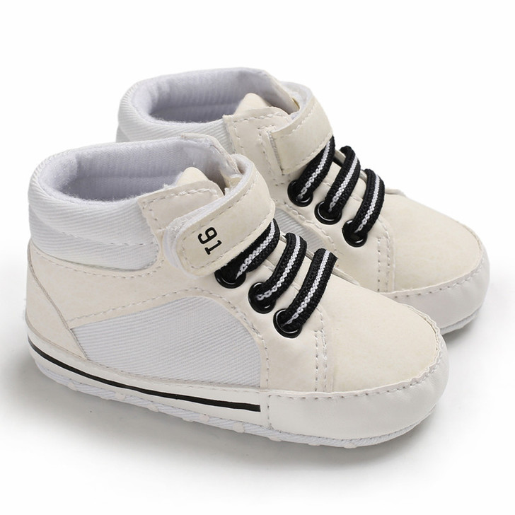 Generic White Shoe Baby Boy White, baby boy white sneakers with black and white laces and velcro strap.