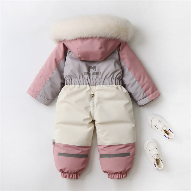 Minnie Me Waterproof Jumpsuit Kids Ski Suit, pink and gray children's snow suit with a fur-lined hood and white shoes.