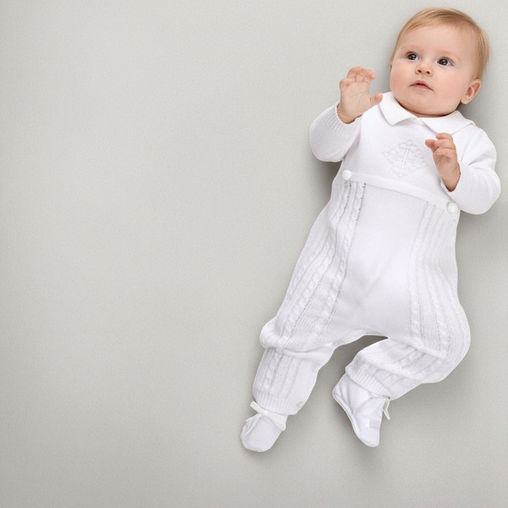 Minnie Me Noah Christening Romper, adorable baby wearing a white christening romper with embroidered details.