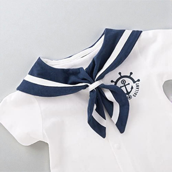 Minnie Me Blue Collar Romper, white romper with navy blue and white striped collar and bow.