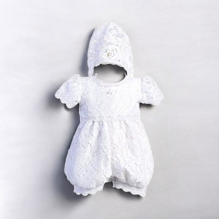 Minnie Me Emily Christening Romper, white lace baby romper with a hood and puffed sleeves placed on a plain background.