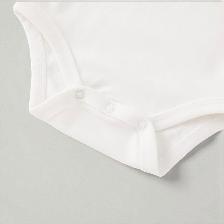 Minnie Me White Romper Cotton Essential, white baby romper with snap closures and soft cotton fabric.