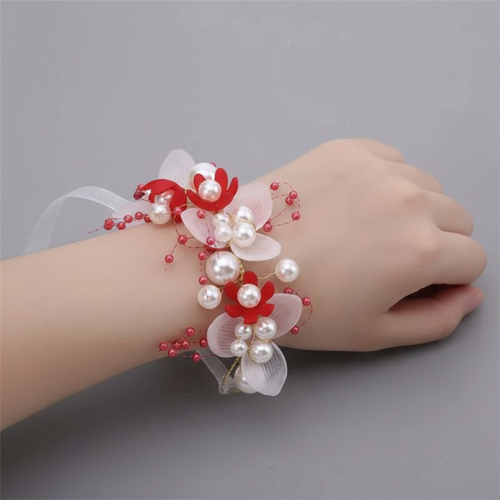 Minnie Me Pearl Flower Headband, decorative headband with white and red artificial flowers, pearls, and ribbons for girls or women.