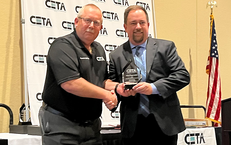 Ben receives Distinguished Service Award from CETA