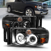 Anzo 111490 - 2002-2005 Dodge Ram 1500 Projector Headlights w/ Halo Black Clear Amber