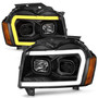 Anzo 111543 - 2005-2007 Jeep Grand Cherokee Projector Headlights w/ Light Bar Switchback Black Housing