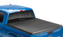 Lund 950186 - 16-23 Toyota Tacoma (5ft. Bed) Genesis Tri-Fold Tonneau Cover - Black