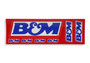 B&M 669959 - Decal; BM Logo; 2.5 in. x 7.75 in.;