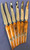 Set of 6 Caramel Bakelite Handled Knife set With Curling Rock and Brooms On Handles