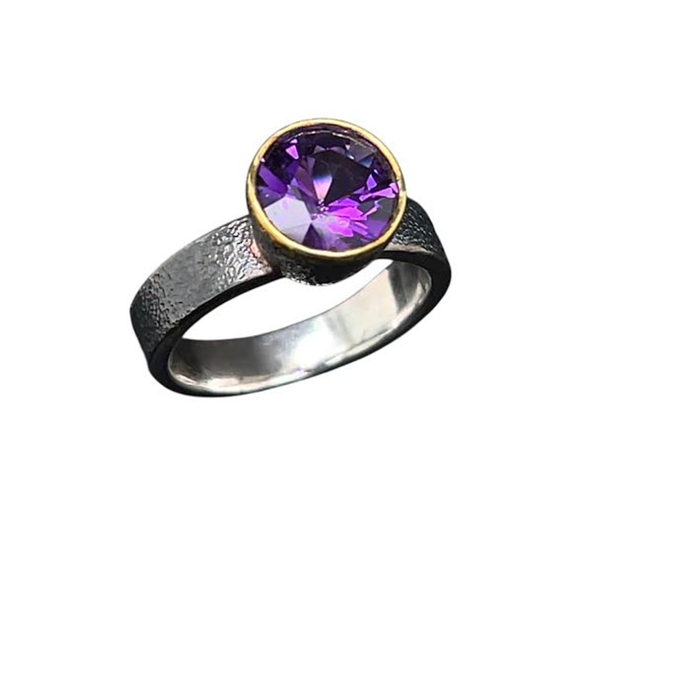 Amethyst Ring  & 22K gold. I cut this top grade Brazilian  Amethyst. Fabricated in patina silver with 22K gold bezel highlight in a 6 ¾  ring size