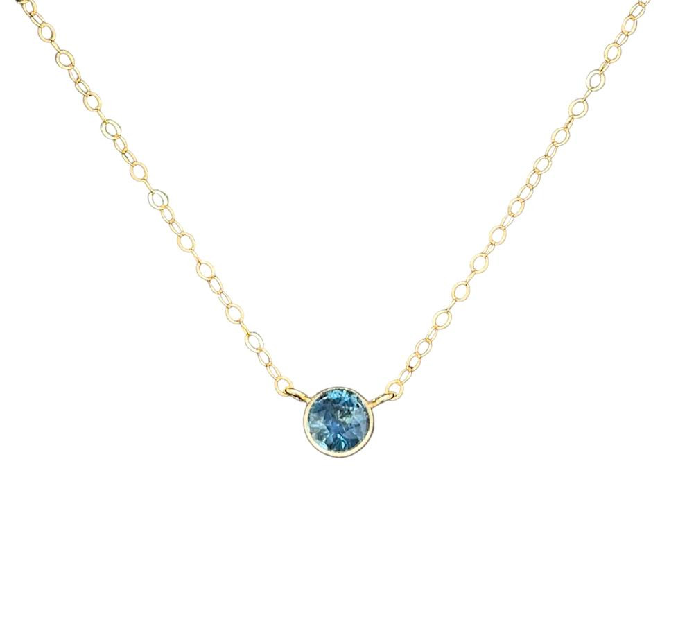 Montana Sapphire Pendant. I cut this beautiful Blue Sapphire in my favorite design called ‘Classic’ which has 58 facets at 0.7 carats.  Clean design set in an 18K gold bezel with 14K gold components and internal fine silver seat. Comes with an 18” gold filled chain.