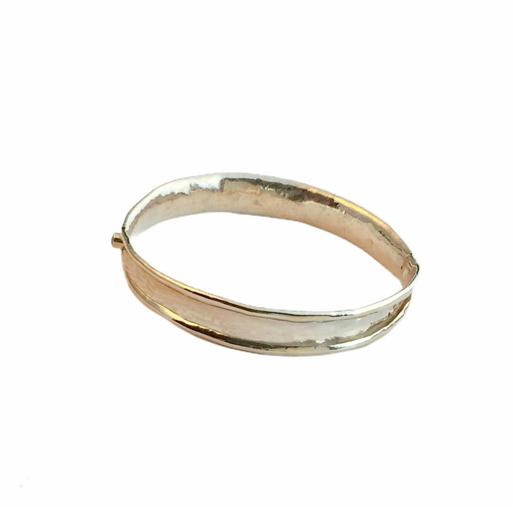 SS anti-clastic bangle with white sapphires