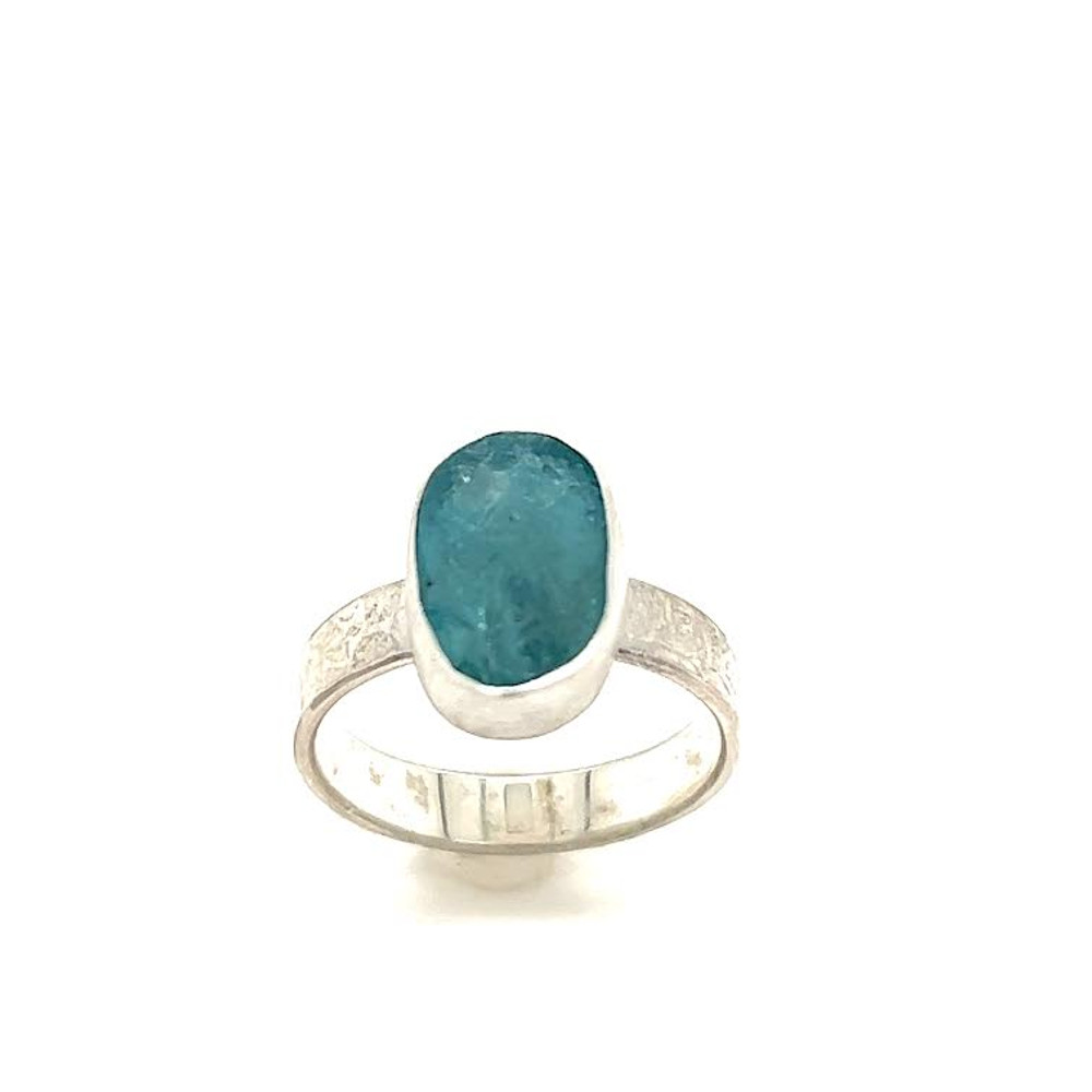 Apatite Gemstone ring with uncut natural crystal face where crystalline surface structure can be seen. Sterling silver in a size 6.5