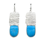 Persian Turquoise Earrings.
I cut these matching turquoise shapes from a rare and exceptional specimen from Iran’s old mine locations. The metal texture has been created from a casting which illustrates the intricate internal structure of the cuttlefish. Made with fine silver and sterling silver. Persian Turquoise Earrings.
I cut these matching turquoise shapes from a rare and exceptional specimen from Iran’s old mine locations. The metal texture has been created from a casting which illustrates the intricate internal structure of the cuttlefish. Made with fine silver and sterling silver.