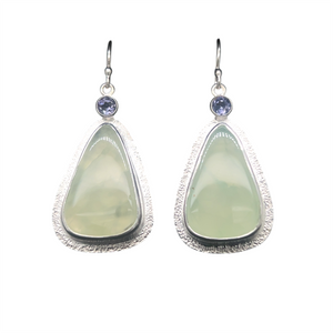 Prehnite and Tanzanite Earrings 2. I cut these matching shapes of Prehnite from Australia and set them in fine silver with Tanzanite accent stones in a textured sterling silver setting.