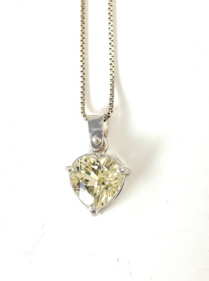 Faceted yellow labradorite heart set in sterling silver