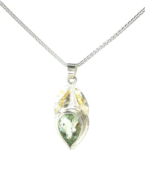 Faceted parsiolite set in fine silver