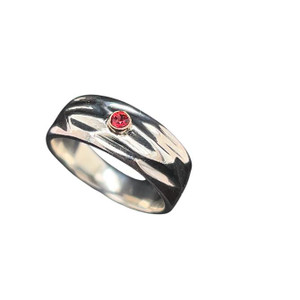 Handcut ring with Ruby. I cut wax by hand and casted this pattern into this tapered ring. Set with a really bright Ruby from Vietnam. Size 6.5