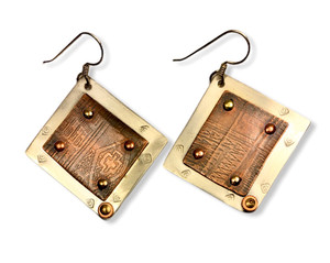 Rustic Earrings - etched copper on sterling silver

brass rivets

sterling silver ear wires

1.25" x 1.25"