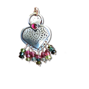 Sterling silver etched and hand fabricated sacred heart with Pink Tourmaline bezel set stone and multicolored tourmaline bead fringe.   25mm x 45mm.

18" Sterling Silver Rolo chain with SS lobster clasp.