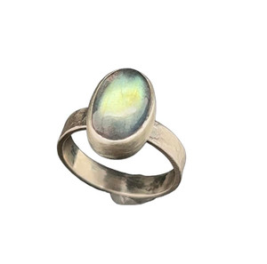 Gem Labradorite Ring. This is the highest quality labradorite you can get and almost looks like a moonstone. I cut this high dome stone from a deposit in Madagascar. Made with fine silver bezel and sterling textured band in a size 6.5