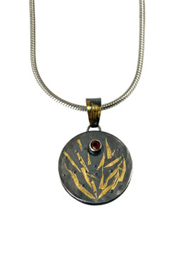 Faceted Madeira citrine beads with a silver /gold pendant