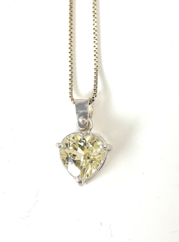 Faceted yellow labradorite heart set in sterling silver