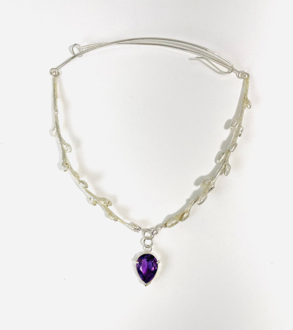 Sterling silver cast branches with faceted amethyst drop