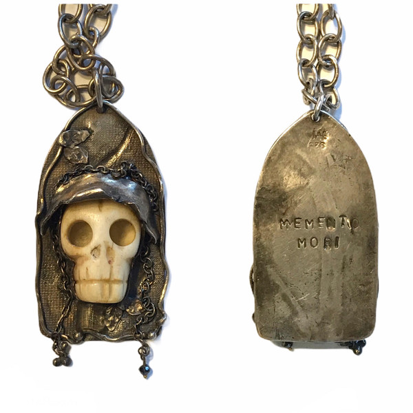 Sterling/ bone/ black diamond skull pendant on sterling chain, message "Memento mori" on back. (Remember you're mortal). One of a kind. For men or women. designed and all hand fabricated by,    J A Lindberg